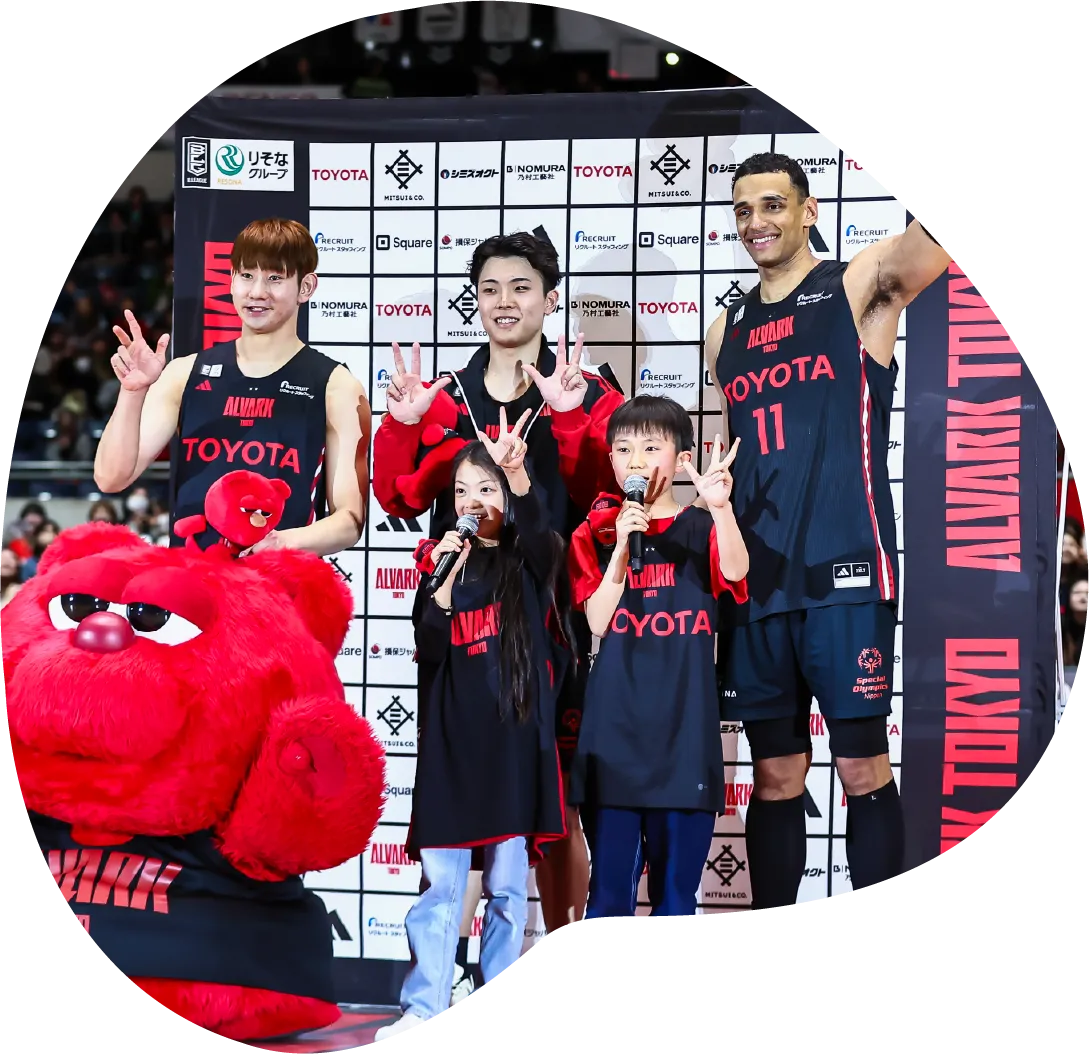 選手とキッズの写真